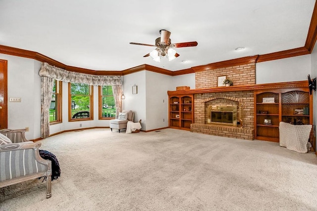 2820 S Victoria Ln, Blue Springs, MO 64015 - unfurnished living room with ornamental molding, ceiling fan, baseboards, carpet, and a fireplace
