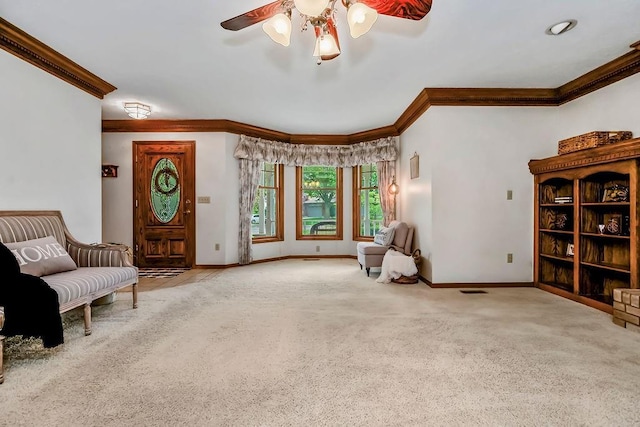 2820 S Victoria Ln, Blue Springs, MO 64015 - sitting room featuring ornamental molding, a ceiling fan, carpet flooring, and baseboards