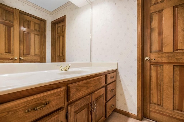 2820 S Victoria Ln, Blue Springs, MO 64015 - bathroom with wallpapered walls, vanity, and baseboards