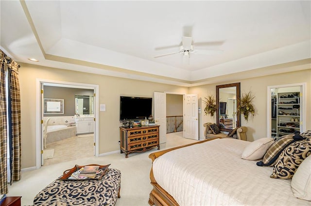 1605 Ridge Rd, Leavenworth, KS 66048 - bedroom featuring a raised ceiling, light carpet, and ensuite bathroom