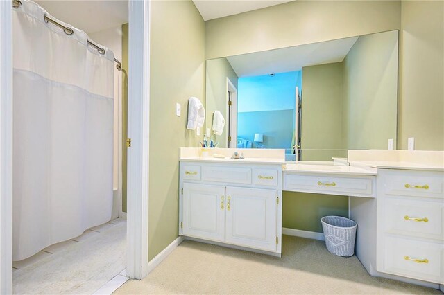 1605 Ridge Rd, Leavenworth, KS 66048 - bathroom with vanity and a shower with shower curtain