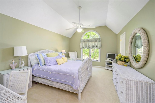 1605 Ridge Rd, Leavenworth, KS 66048 - bedroom featuring light colored carpet, lofted ceiling, ceiling fan, and baseboards