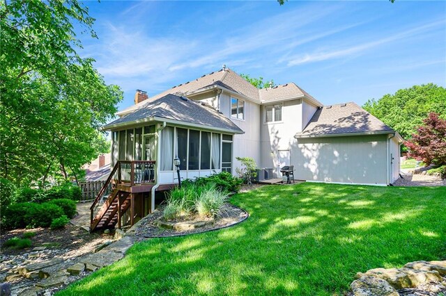 1605 Ridge Rd, Leavenworth, KS 66048 - rear view of house with a sunroom, stairs, a yard, and a shingled roof