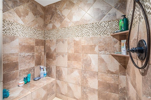 bathroom view of tiled shower