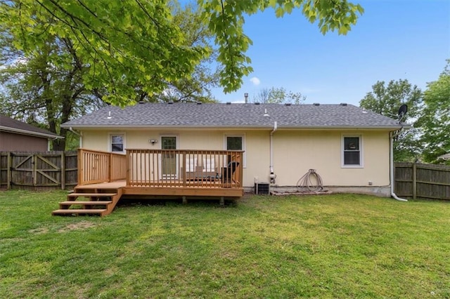 back of property with a wooden deck and cooling unit