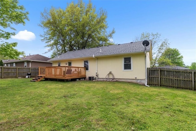 rear view of property with a wooden deck