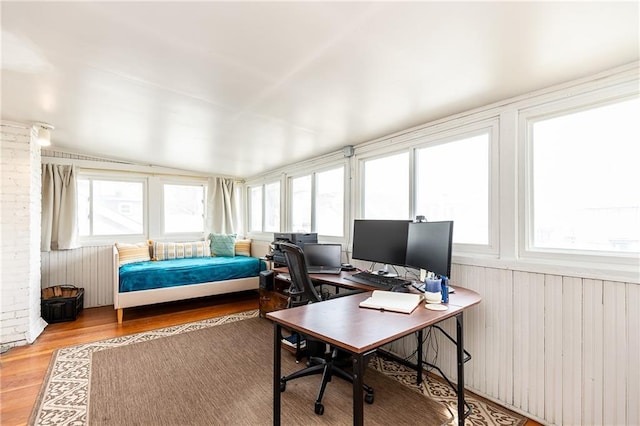 108 W 61st Ter, Kansas City, MO 64113 - bedroom with a desk, radiator heating unit, and wood finished floors