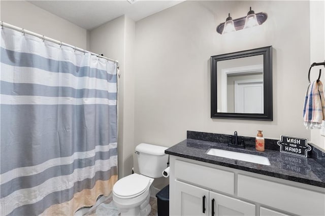 9424 N Belleview Ave, Kansas City, MO 64155 - bathroom with toilet, vanity, and curtained shower