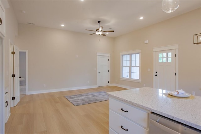 606 E 3rd St, Cameron, MO 64429 - kitchen with dishwasher, a ceiling fan, light wood-type flooring, white cabinetry, and recessed lighting