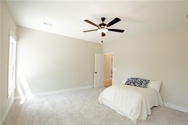 606 E 3rd St, Cameron, MO 64429 - bedroom featuring light colored carpet, baseboards, and ceiling fan