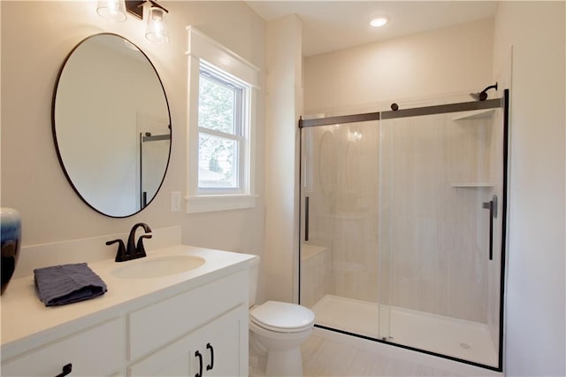 606 E 3rd St, Cameron, MO 64429 - full bath featuring vanity, toilet, and a shower stall