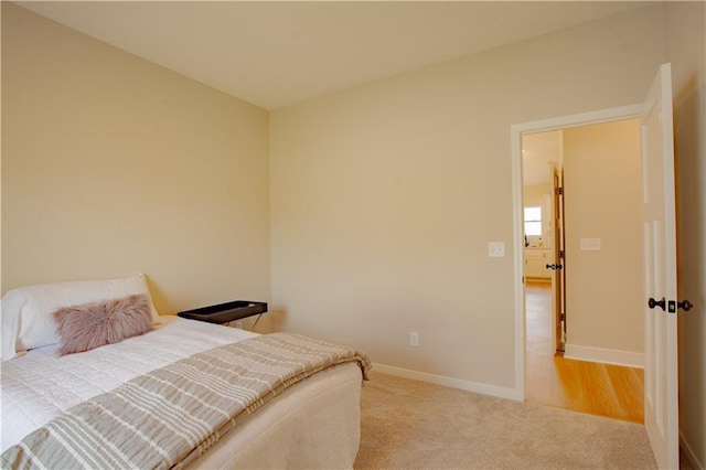 606 E 3rd St, Cameron, MO 64429 - bedroom featuring light colored carpet and baseboards