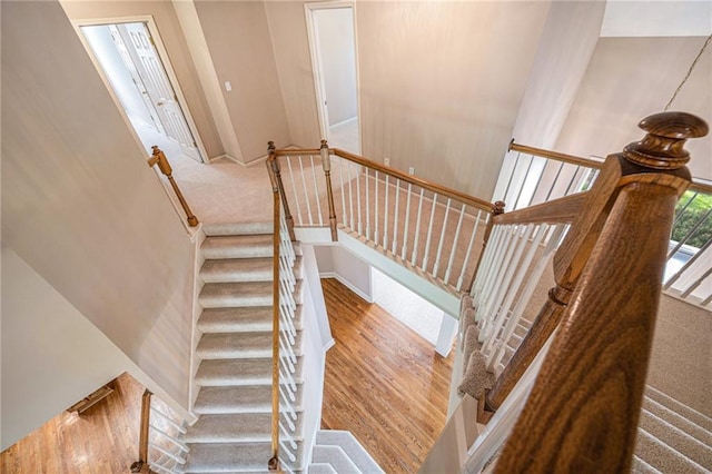 6209 NW 78th St, Kansas City, MO 64151 - stairway with wood finished floors and baseboards