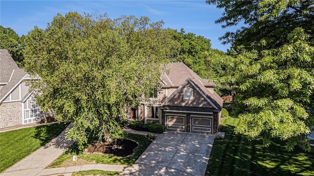 6209 NW 78th St, Kansas City, MO 64151 - view of front of property with concrete driveway and a garage