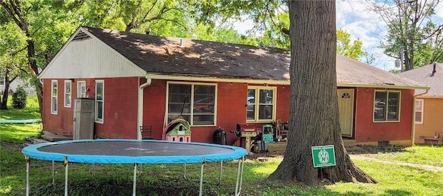 view of outbuilding featuring a trampoline