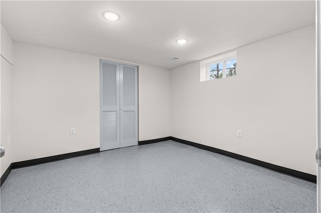 3107 N 34th St, Kansas City, KS 66104 - basement with baseboards and recessed lighting