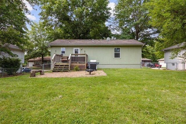 808 SE 19th St, Oak Grove, MO 64075 - back of property featuring a deck