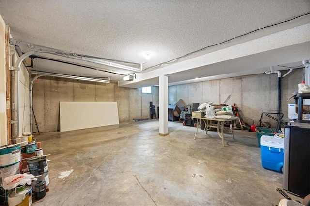 808 SE 19th St, Oak Grove, MO 64075 - unfinished basement featuring a textured ceiling