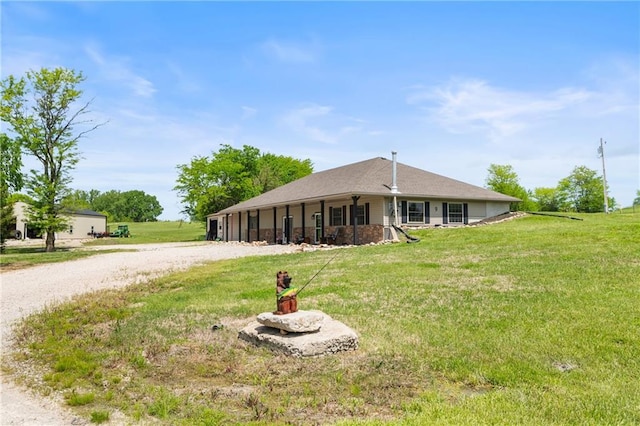 9 SW 500th Rd, Warrensburg, MO 64093 - view of front facade featuring a front yard and a porch