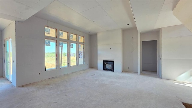 unfurnished living room with a fireplace