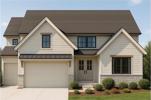 view of front of property with stone siding, driveway, a standing seam roof, and metal roof