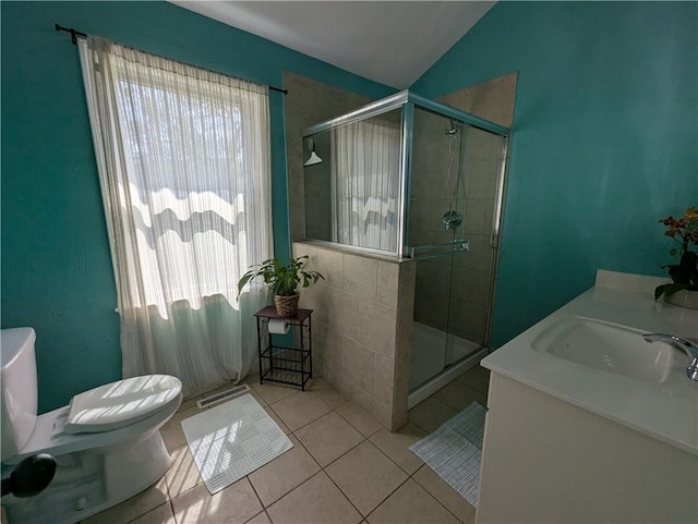 full bathroom with healthy amount of natural light, a shower stall, toilet, and lofted ceiling