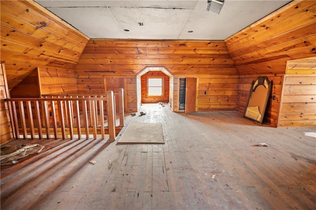 511 E 9th St, Trenton, MO 64683 - bonus room featuring wood-type flooring, vaulted ceiling, and wooden walls