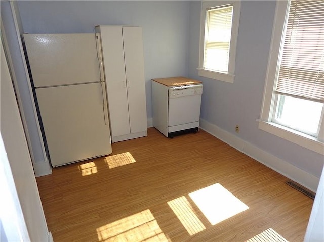 2011 S Broadway St, Pittsburg, KS 66762 - spare room featuring light wood-style floors and baseboards