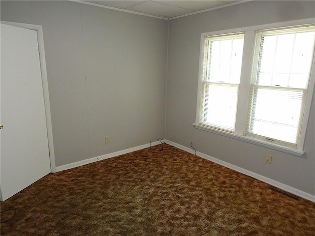 2011 S Broadway St, Pittsburg, KS 66762 - spare room featuring ornamental molding, carpet flooring, and baseboards