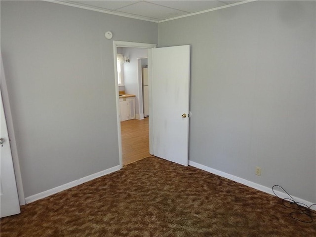 2011 S Broadway St, Pittsburg, KS 66762 - unfurnished room with crown molding, carpet flooring, and baseboards