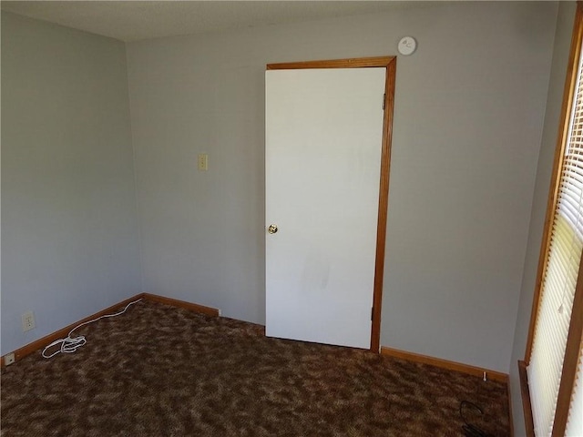 2011 S Broadway St, Pittsburg, KS 66762 - unfurnished bedroom with carpet floors and baseboards