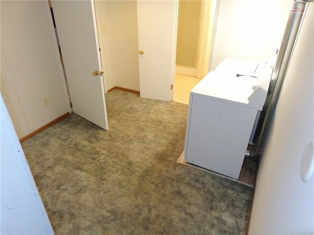 2011 S Broadway St, Pittsburg, KS 66762 - laundry room featuring light carpet