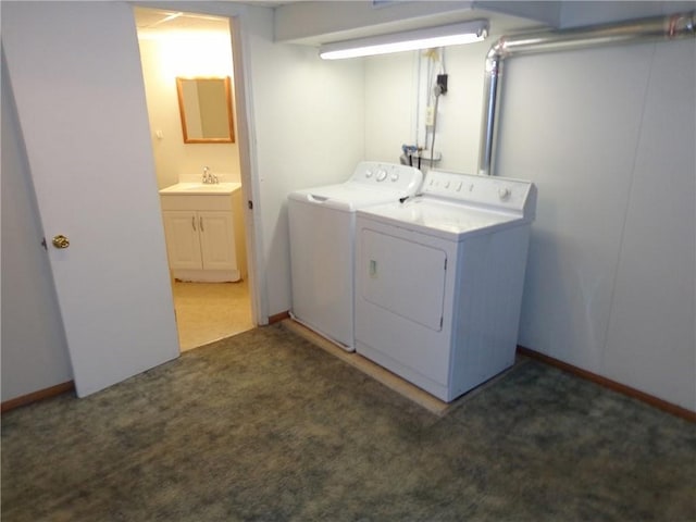2011 S Broadway St, Pittsburg, KS 66762 - laundry area featuring separate washer and dryer, baseboards, and carpet flooring