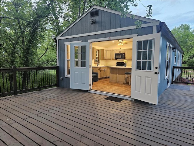 13 S Lakeside Cir, Linn Valley, KS 66040 - wooden deck with an outbuilding