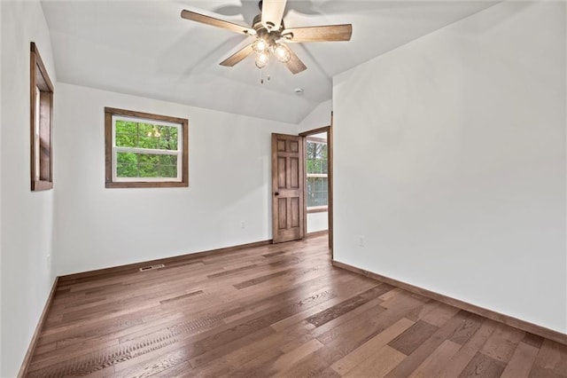 13 S Lakeside Cir, Linn Valley, KS 66040 - empty room with wood finished floors, lofted ceiling, baseboards, and ceiling fan