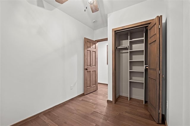 13 S Lakeside Cir, Linn Valley, KS 66040 - unfurnished bedroom with wood finished floors, baseboards, and a ceiling fan