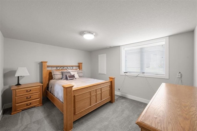 10523 N Dalton Ave, Kansas City, MO 64154 - bedroom featuring dark colored carpet, baseboards, and a textured ceiling