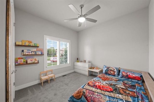 10523 N Dalton Ave, Kansas City, MO 64154 - carpeted bedroom featuring baseboards and ceiling fan