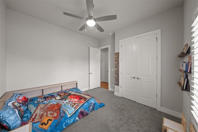 10523 N Dalton Ave, Kansas City, MO 64154 - bedroom with carpet, baseboards, a closet, and ceiling fan