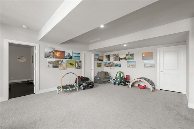 10523 N Dalton Ave, Kansas City, MO 64154 - playroom with carpet flooring, baseboards, and recessed lighting