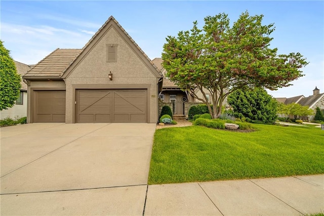 15201 Catalina St, Leawood, KS 66224 - view of front of property with a garage, concrete driveway, a front lawn, and a tiled roof
