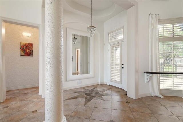 15201 Catalina St, Leawood, KS 66224 - foyer with baseboards and a chandelier