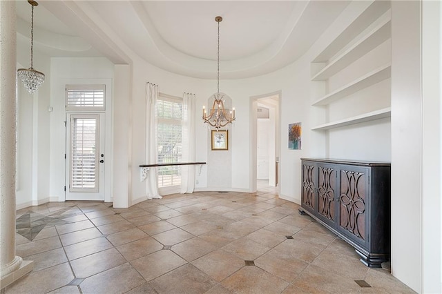15201 Catalina St, Leawood, KS 66224 - entrance foyer featuring a chandelier, baseboards, and tile patterned floors