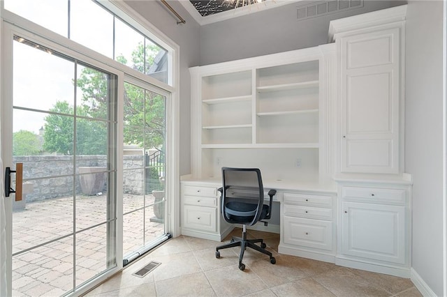 15201 Catalina St, Leawood, KS 66224 - unfurnished office with built in study area and light tile patterned flooring