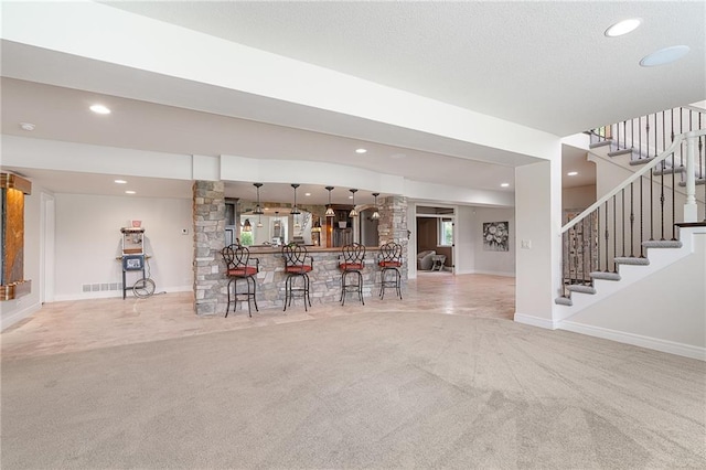 15201 Catalina St, Leawood, KS 66224 - indoor bar featuring carpet, stairs, recessed lighting, and baseboards