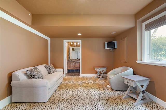 15201 Catalina St, Leawood, KS 66224 - living area with baseboards, a chandelier, recessed lighting, and light tile patterned flooring