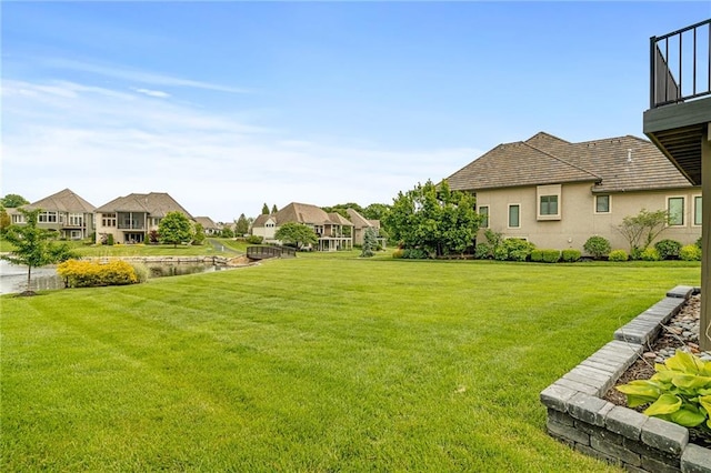 15201 Catalina St, Leawood, KS 66224 - view of green lawn with a residential view