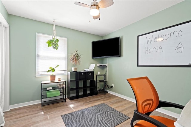 201 N Cleveland Ave, Belton, MO 64012 - home office with ceiling fan, wood finished floors, and baseboards