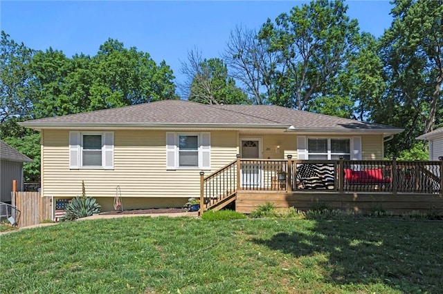 201 N Cleveland Ave, Belton, MO 64012 - view of front of home with a front lawn and a wooden deck