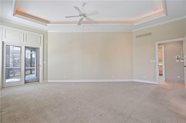 4704 W 152nd St, Leawood, KS 66224 - unfurnished room with a raised ceiling, crown molding, light colored carpet, and a ceiling fan